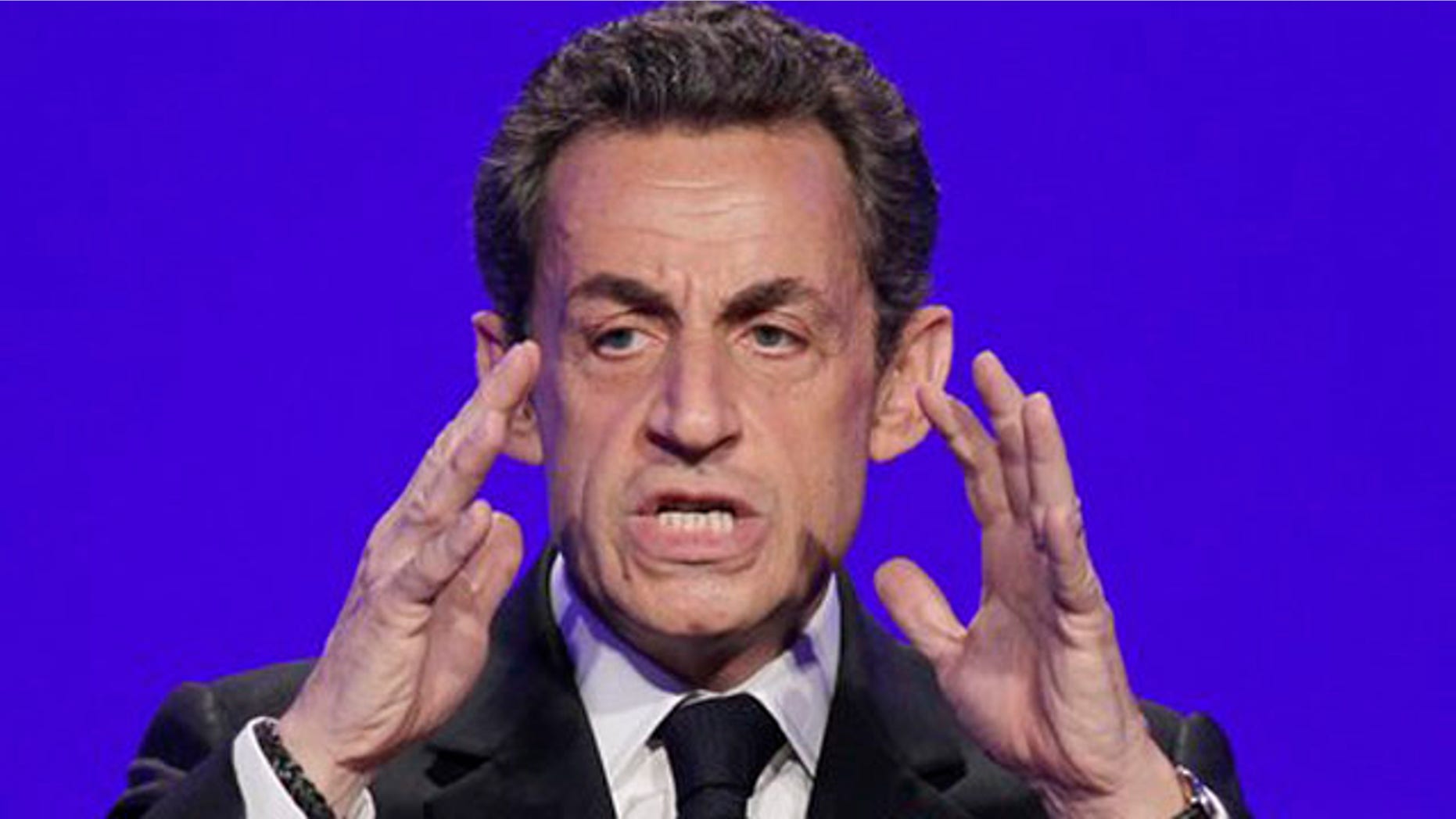 April 5, 2012: France's President and candidate for re-election in 2012, Nicolas Sarkozy, gestures as he speaks to reporters during a press conference as part of his presidential campaign in Paris.