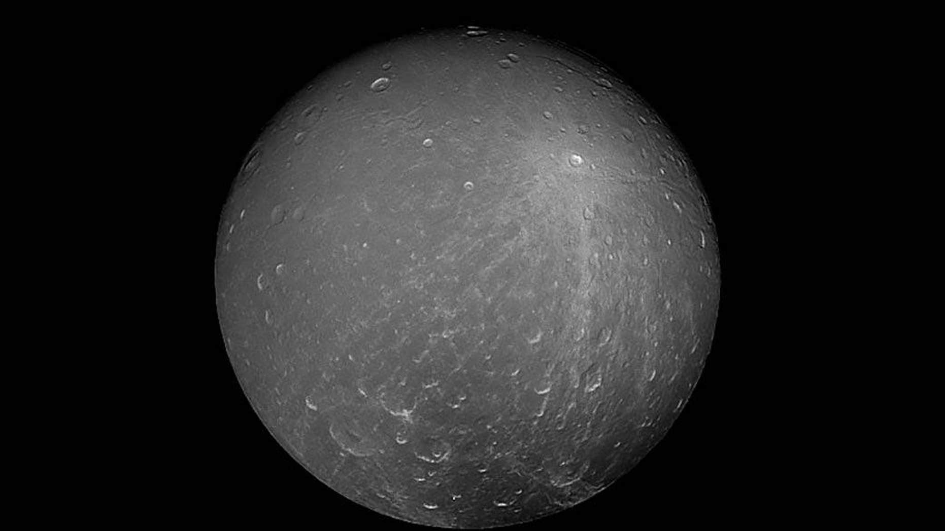 NASA's Cassini spacecraft captured this image of the Saturn moon Dione on July 23, 2012.