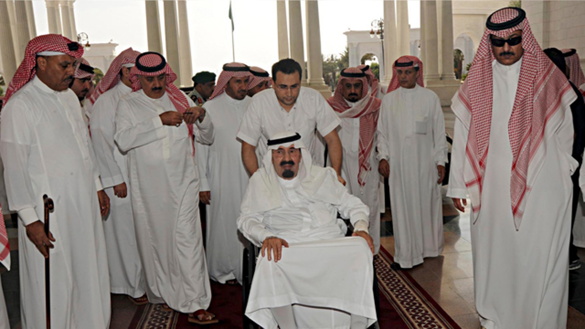 Nov. 19: King Abdullah, center, of Saudi Arabia arrives to his palace in Riyadh, Saudi Arabia. The Saudi Press Agency (SPA) said that King Abdullah entered a hospital on Friday due to complications in the back pain suffered by them and the doctors advised him to rest. (AP/Saudi Press Agency)
