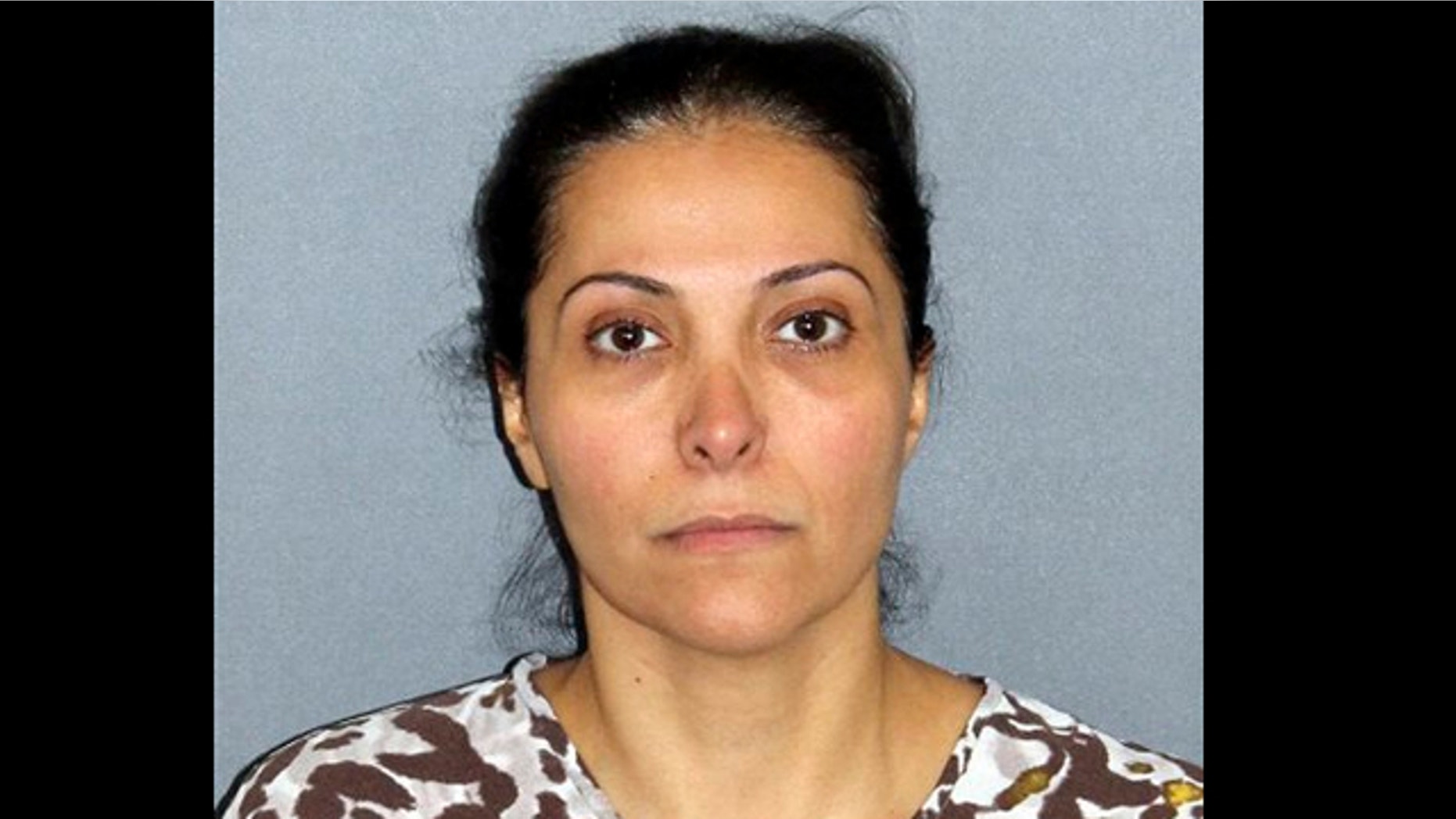 UNDATED: This image provided by the Irvine Police Department shows Meshael Alayban, who was arrested July 9, 2013 in Irvine, Calif., for allegedly holding a domestic servant against her will.