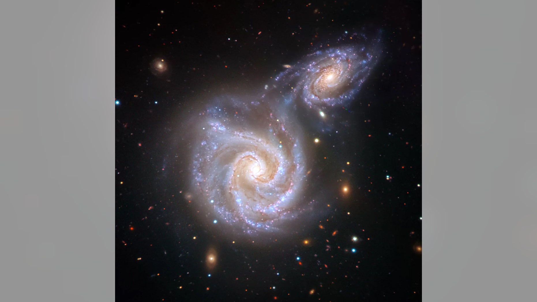 An artistic visualization of the collision between the Milky Way galaxy and the Sausage galaxy, which likely happened between 8 billion and 10 billion years ago. Credit: V. Belokurov (Cambridge, U.K.; and CCA, New York, U.S.) based on the image by ESO/Juan Carlos Muñoz