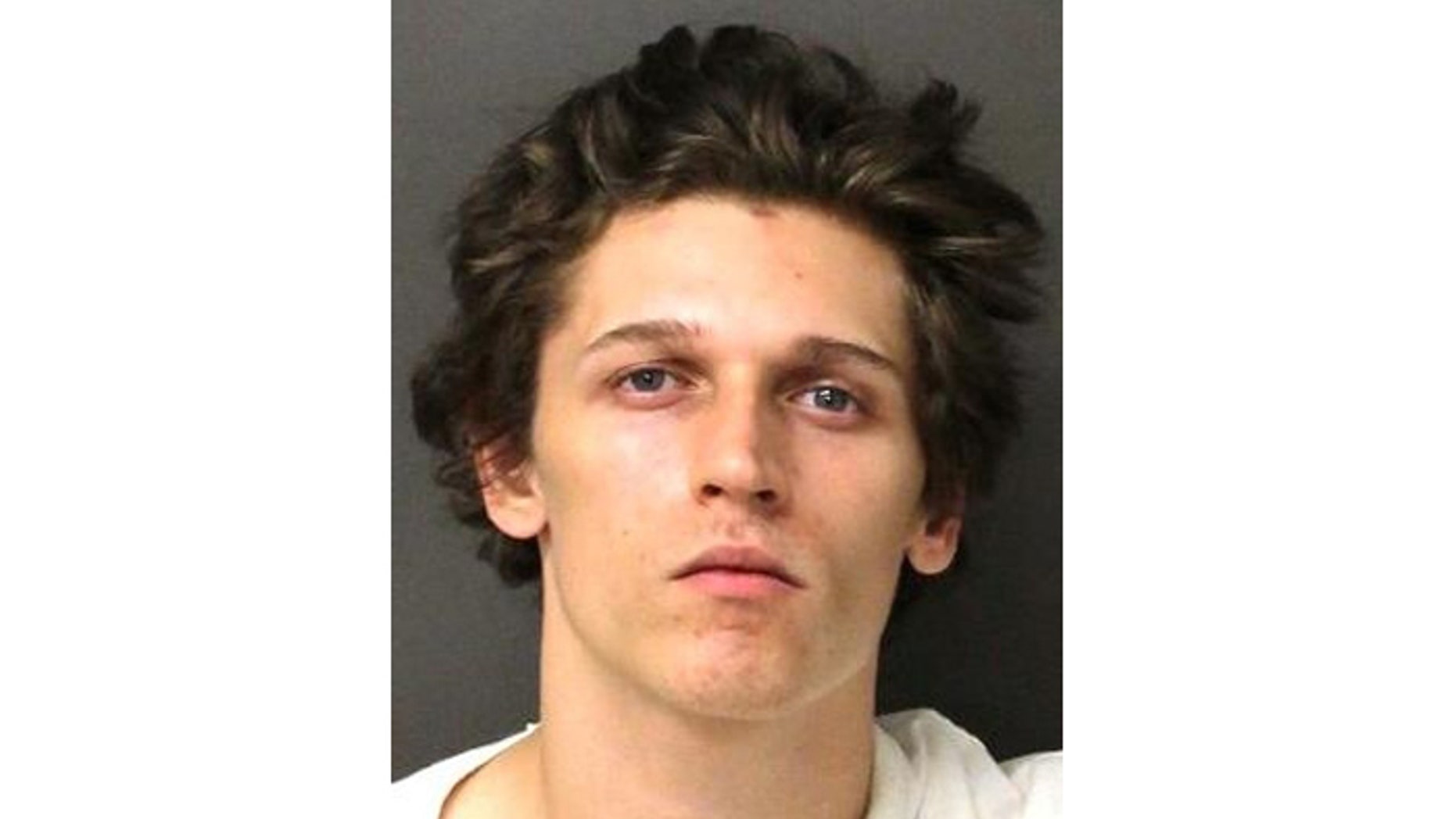 Assault with a delicious weapon? Police say Baker attacked with sausage links.