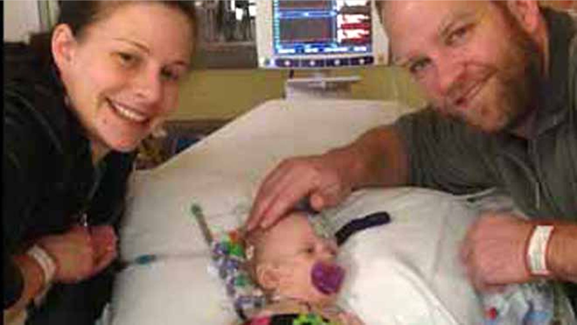Savannah, pictured center, was diagnosed with the same congenital heart defect as her father.