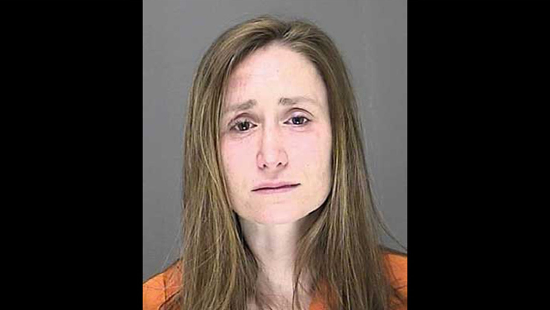 This photo shows 30-year-old Cheryn Scaggs, who is accused of leaving her children in a car while she drank heavily at a bar.