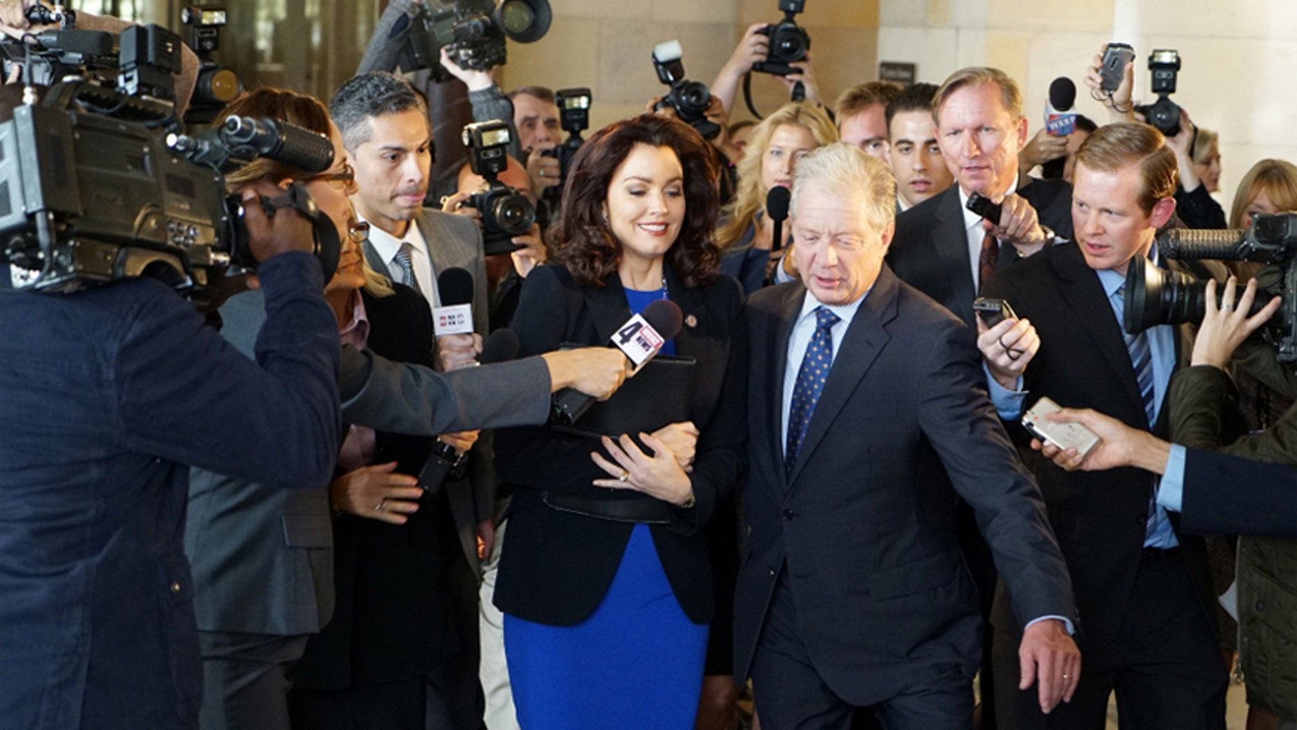 Bellamy Young and Jeff Perry appear in ABC's "Scandal."