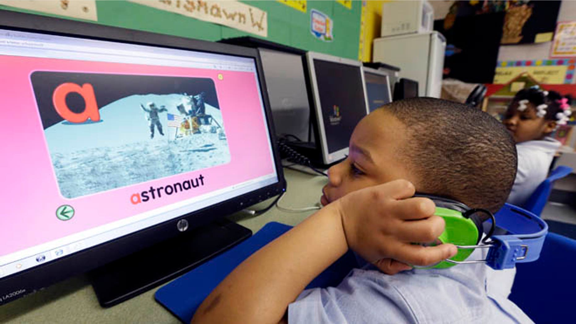 Friday, March 1, 2013: In this photo, Jason Hayes works on a computer in his prekindergarten class at a public school in Buffalo, N.Y. President Barack Obama's proposal to expand access to preschool is seen as a way to close the achievement gap for poor and minority students, improve high school graduation rates and ultimately strengthen the workforce.