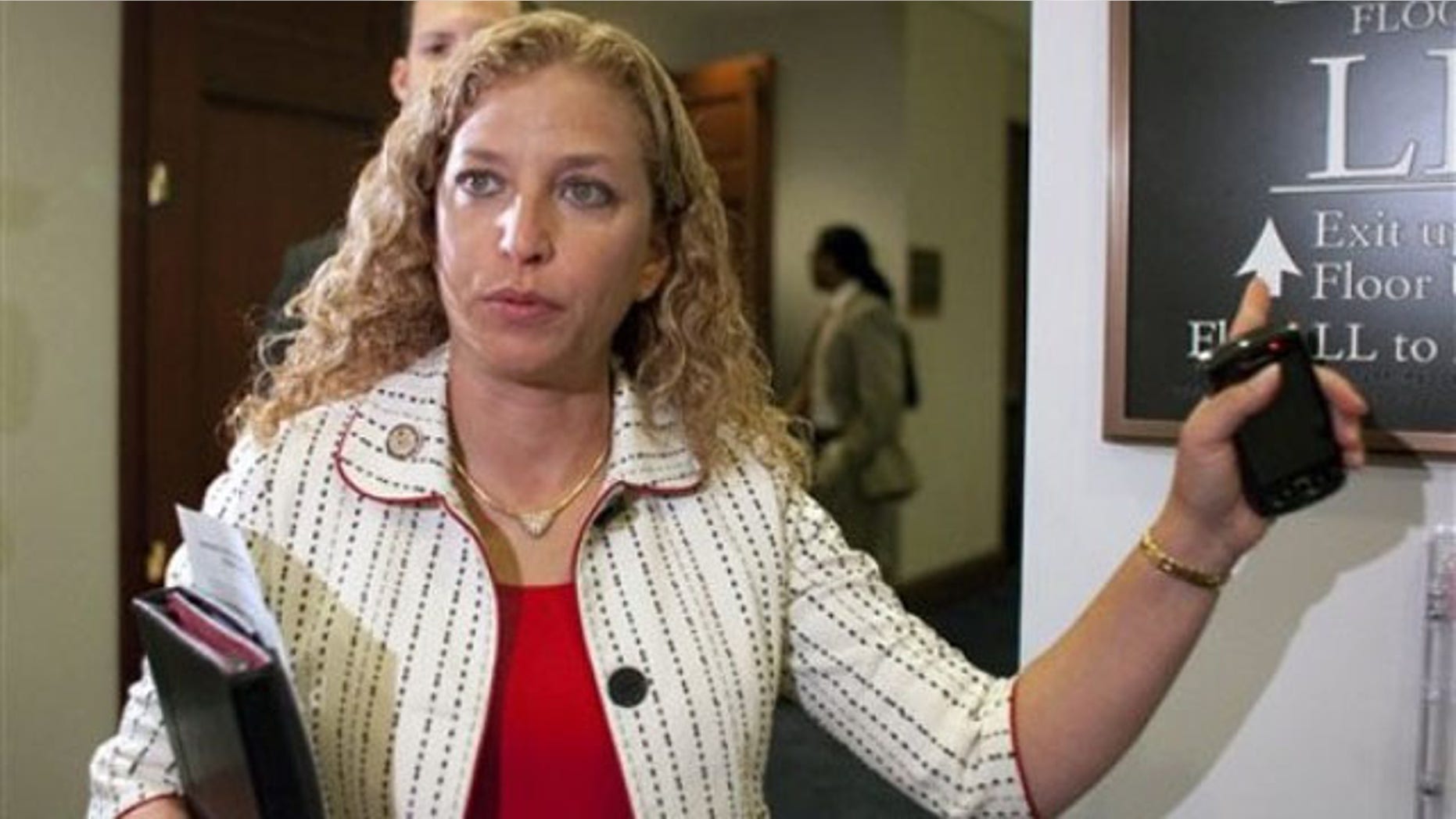 FILE: July, 30, 2011: Rep. Debbie Wasserman-Schultz speaks to reporters following a Democratic Caucus on Capitol Hill in Washington.