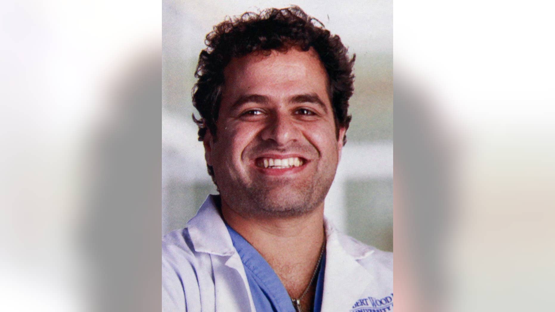 A Manhattan judge has ruled New Jersey cardiologist Dr. Zyad Younan, 44, is off the hook for the $135,000 tab he racked up at Scores strip club. (Robert Wood Johnson University Hospital)