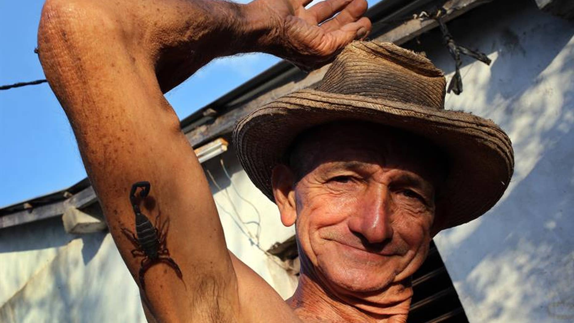 Casañas said he sometimes keeps a scorpion in his hat, in case he starts to feel a pain he needs to treat.