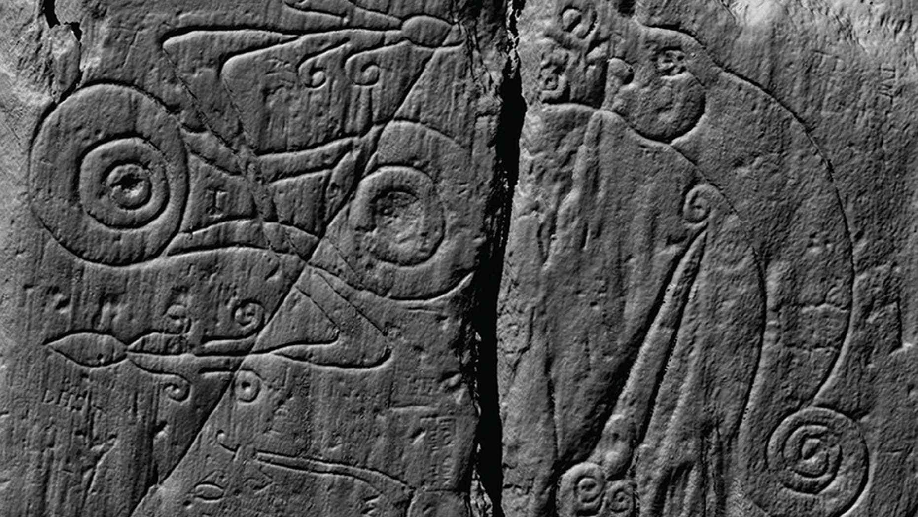 A laser scan image of the Pictish symbols carved at Trusty’s Hill, comprising a z-rod-and-double-disc symbol on the left and a dragon-pierced-by-a-sword symbol on the right (© DGNHAS/CDDV).