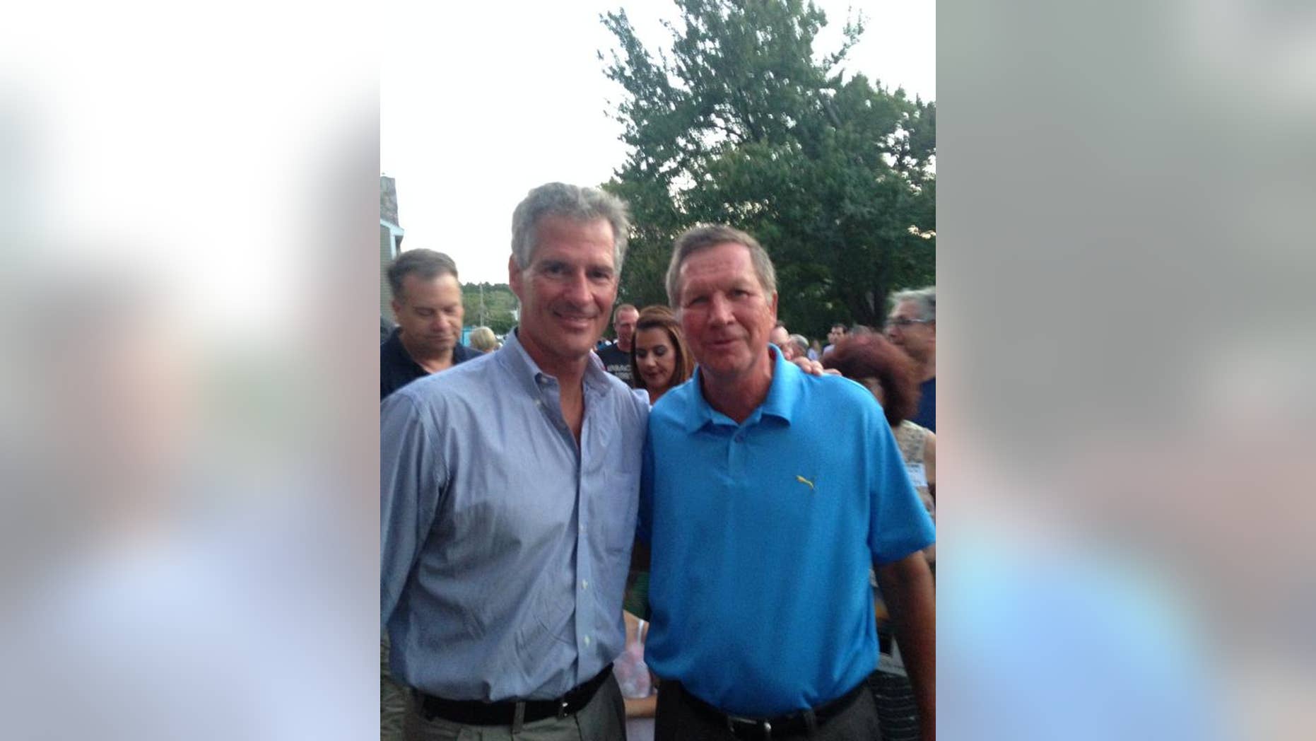Former Mass. Sen. Scott Brown and Ohio Gov. John Kasich at Brown's 'No BS backyard barbecue' event. (Facebook)