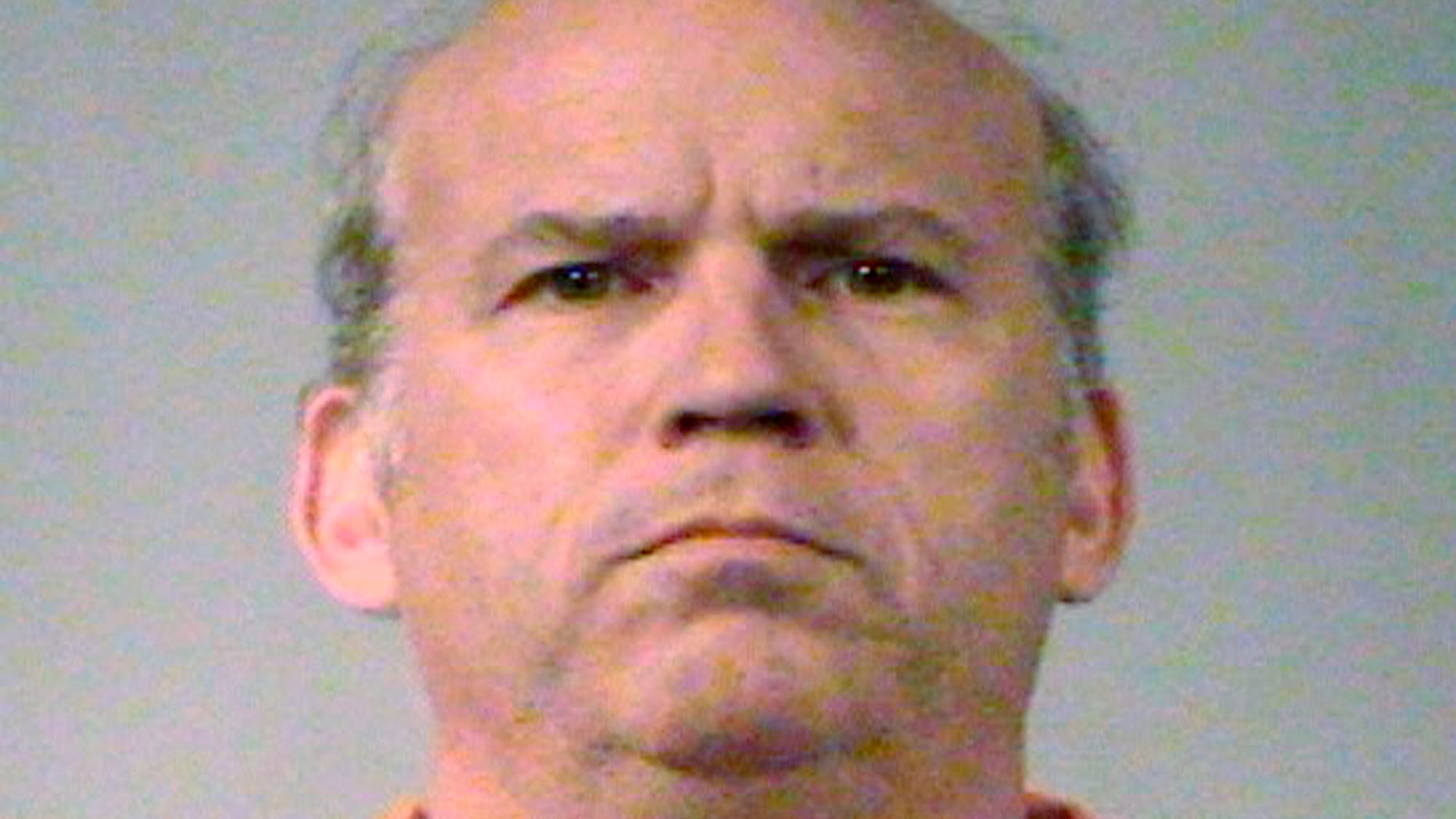 Scott Roeder, 51-year-old Kansas City-area man charged with murder of Kansas abortion doctor George Tiller, is seen in this undated booking photograph