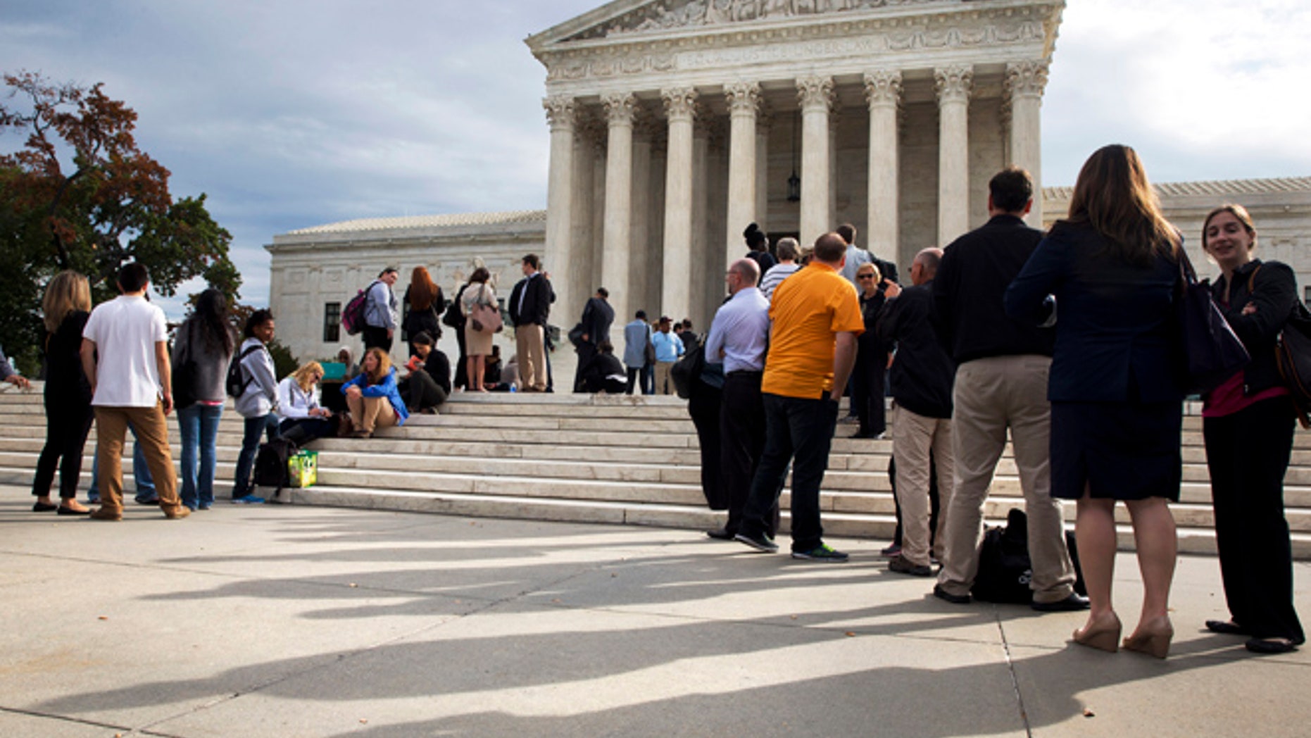 Oct. 13, 2015: People line up outside of the Supreme Court in Washington as the justices began to discuss sentences for young prison 'lifers.'