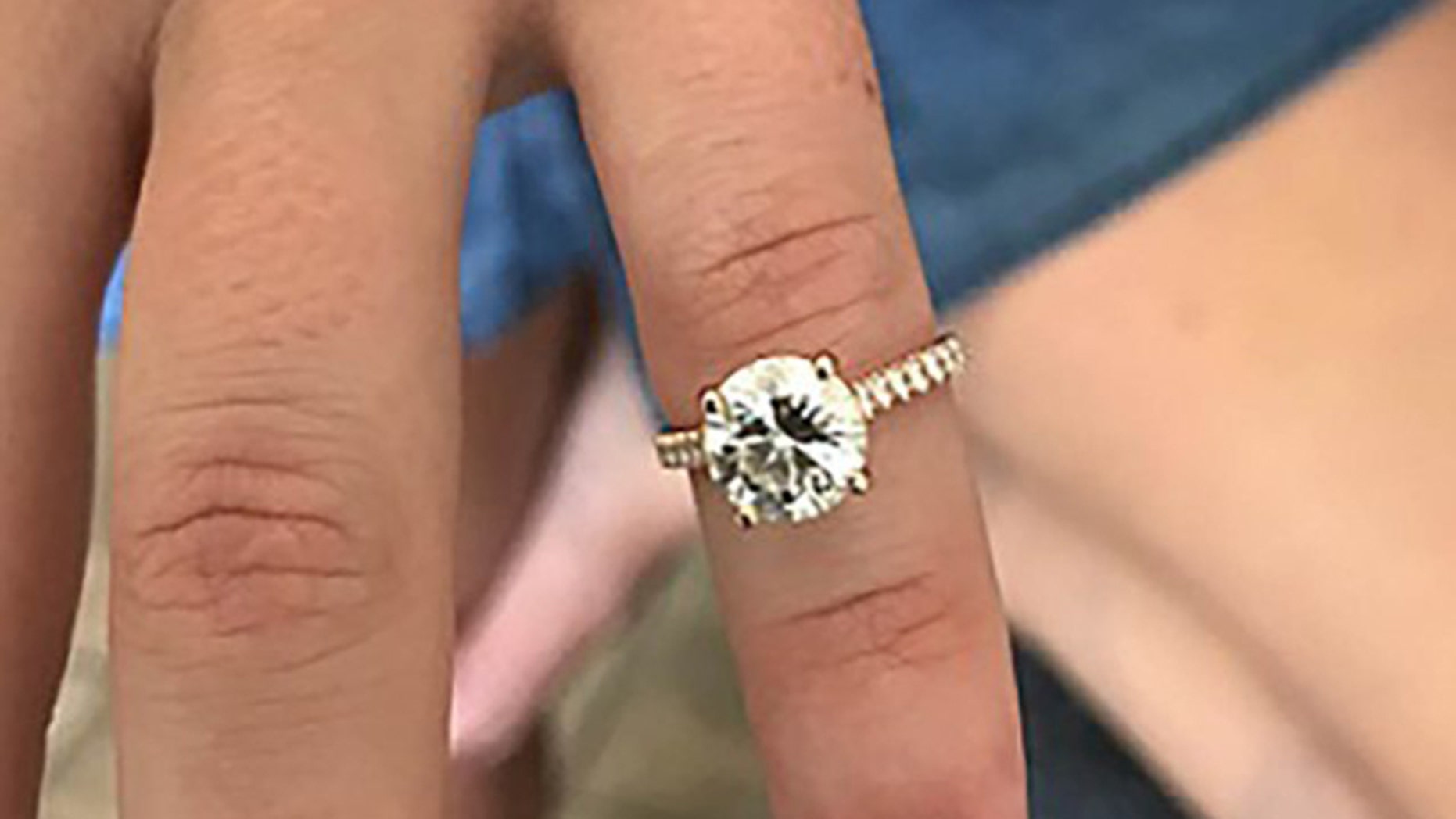 A Suffolk County police officer found this lost engagement ring after searching the sand on Fire Island with a metal detector.