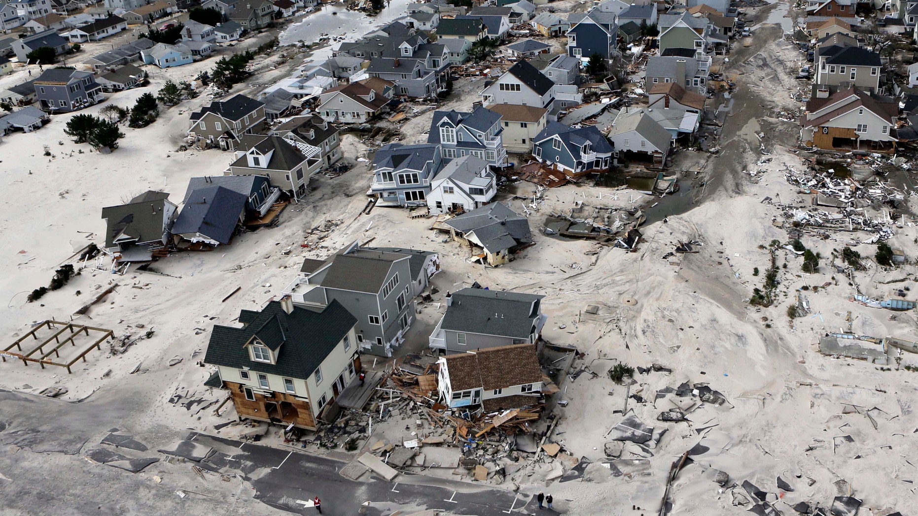 In this Oct. 31, 2012 file photo, a view from the air shows the destroyed homes left in the wake of Superstorm Sandy in Ortley Beach, N.J. (AP Photo/Mike Groll, File)