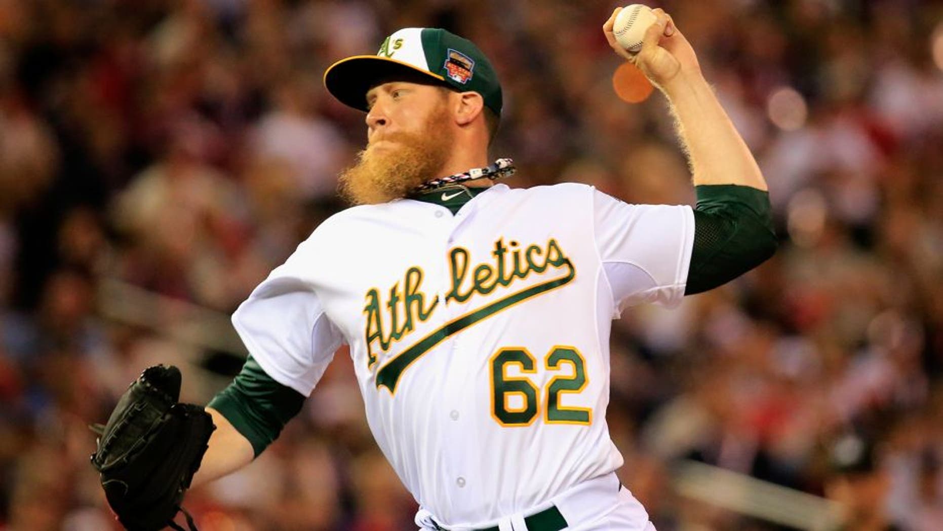 MINNEAPOLIS, MN - JULY 15: American League All-Star Sean Doolittle #62 of the Oakland Athletics pitches against the National League All-Stars during the 85th MLB All-Star Game at Target Field on July 15, 2014 in Minneapolis, Minnesota. (Photo by Rob Carr/Getty Images)