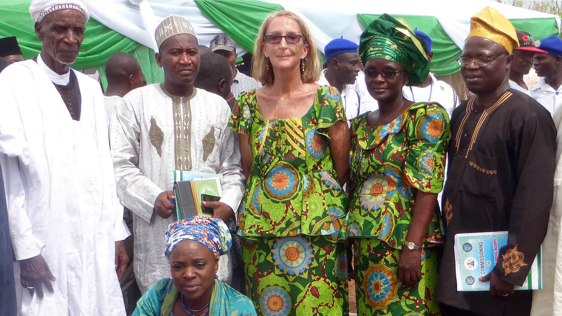 March 6, 2015: Seattle missionary Rev. Phyllis Sortor, center, stands with a delegation of area dignitaries in a town in Nigeria.