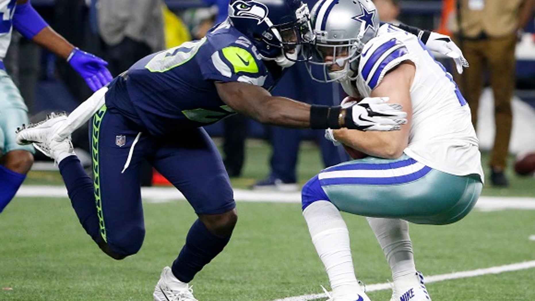Seattle Seahawks player Jeremy Lane, left, reportedly told a trooper during a DUI arrest: “I was more high than anything."