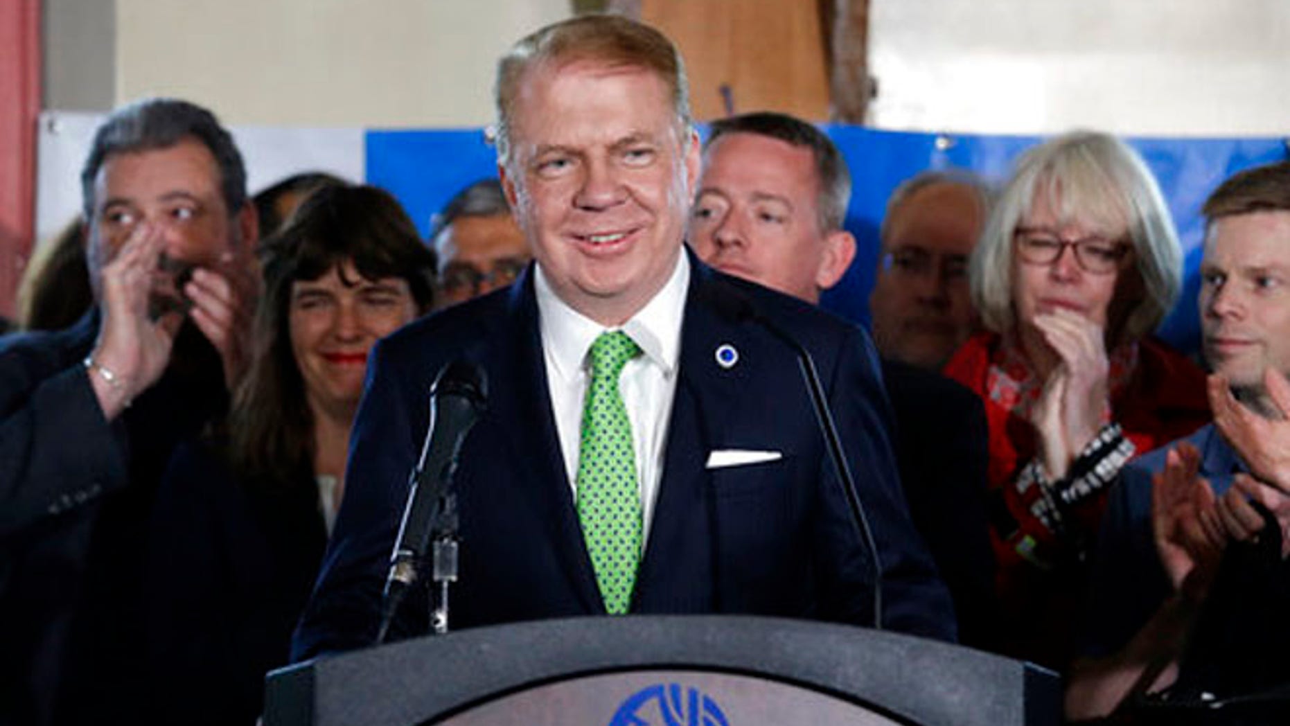 May 9, 2017: Seattle Mayor Ed Murray briefly smiles as supporters applauds his entrance before saying that he is dropping his re-election bid for a second term in Seattle.