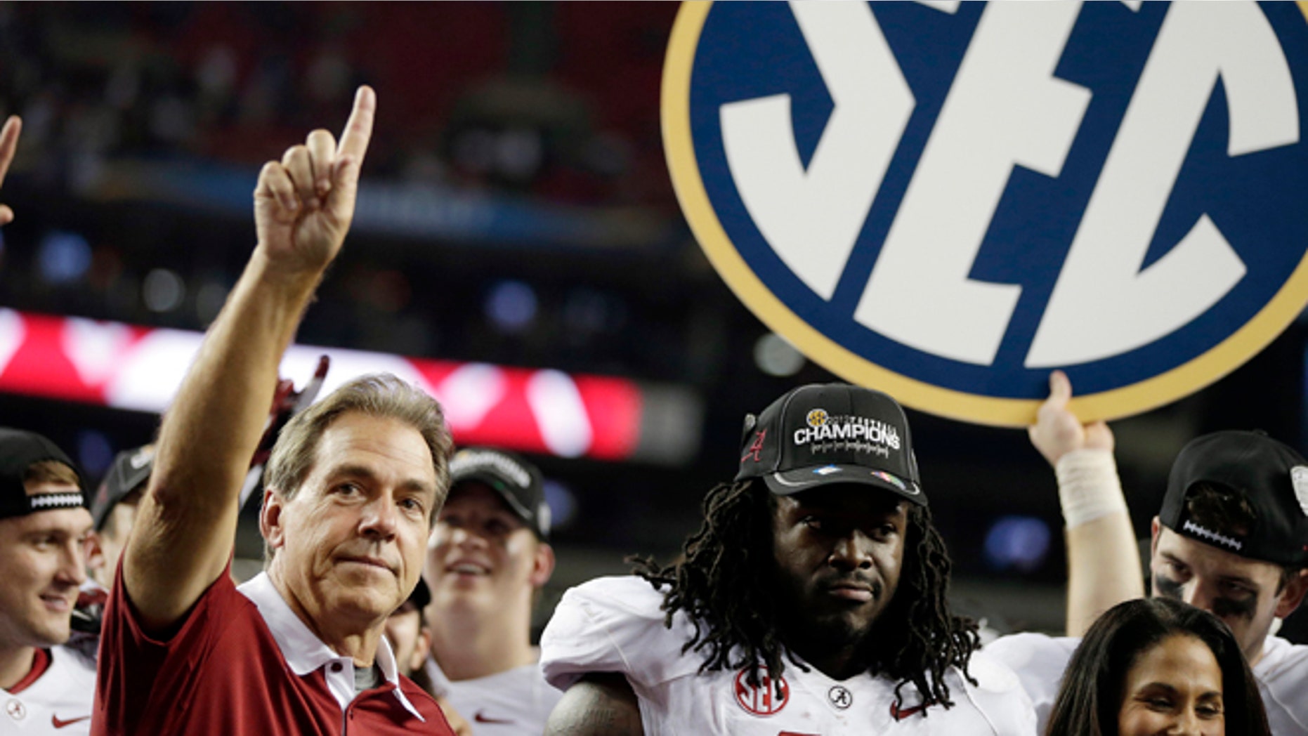 Dec. 1, 2012: Alabama head coach Nick Saban and running back Eddie Lacy after their 32-28 win in the Southeastern Conference championship NCAA college football game against Georgia in Atlanta.