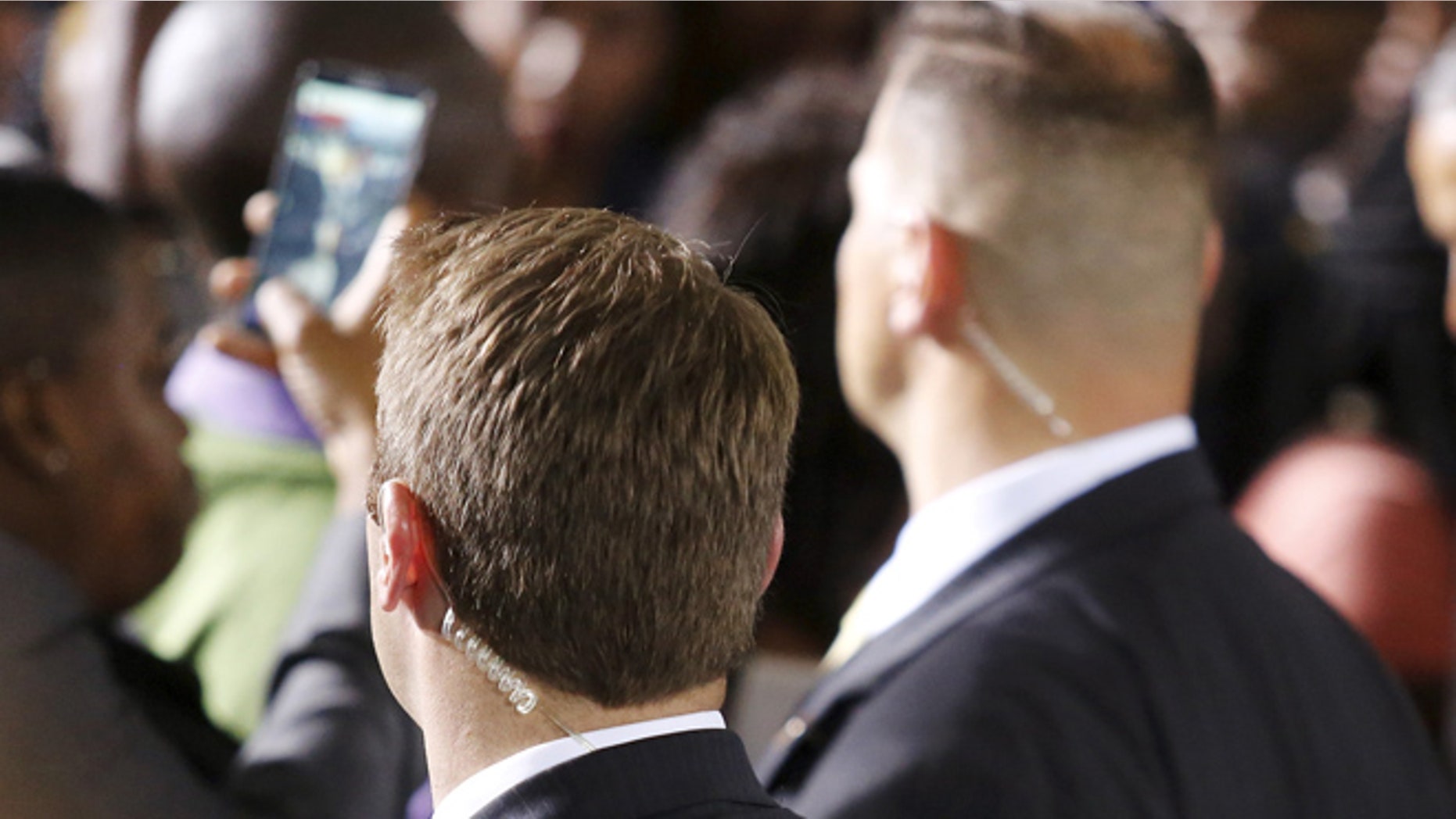 Two unidentified U.S. Secret Service agents.