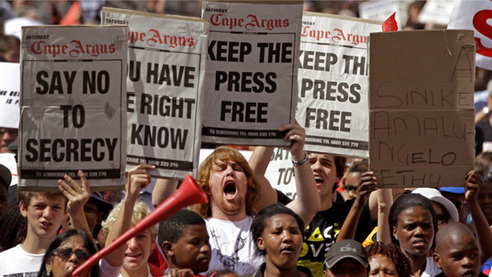 Sept. 17, 2011: People protest against the Secrets Bill in Cape Town, South Africa. South Africa's parliament prepared Monday, Nov. 21, 2011 for a vote the following day on a state secrets bill that critics within and outside the governing party said would smother freedom of expression and make it harder to fight corruption. Sign at right reads "Give Us Our Rights."