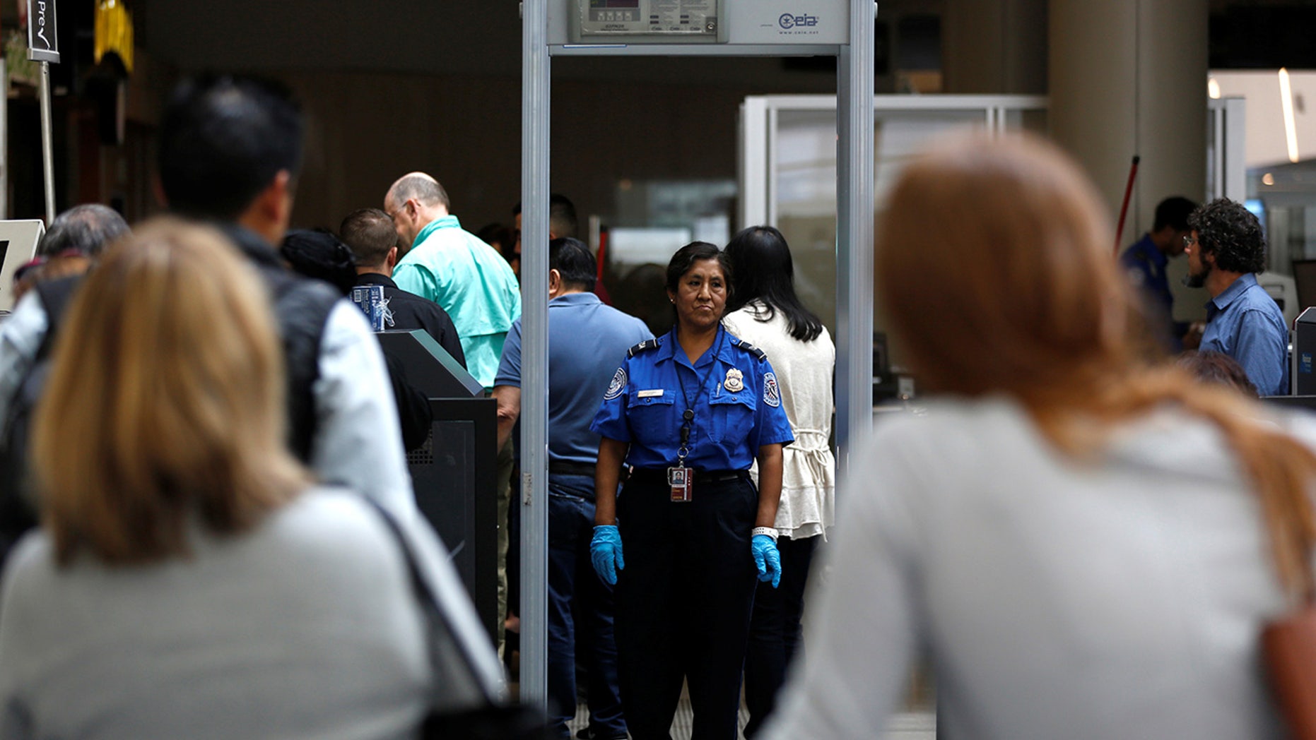 San Jose airport evacuates terminal to investigate security breach.
