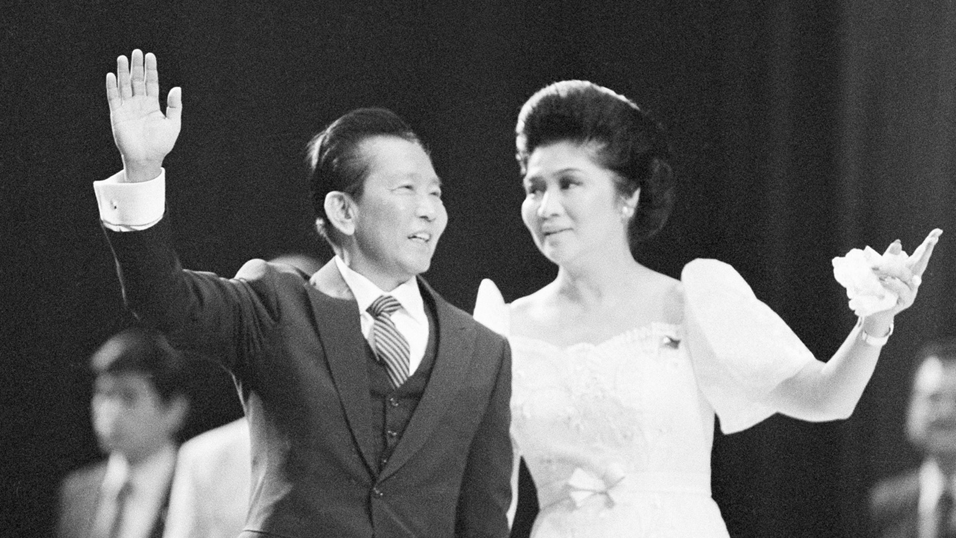 In this Sept. 26, 1982 file photo, Philippine President Ferdinand Marcos and First Lady Imelda Marcos appear at a rally in the Los Angeles Sports Arena.