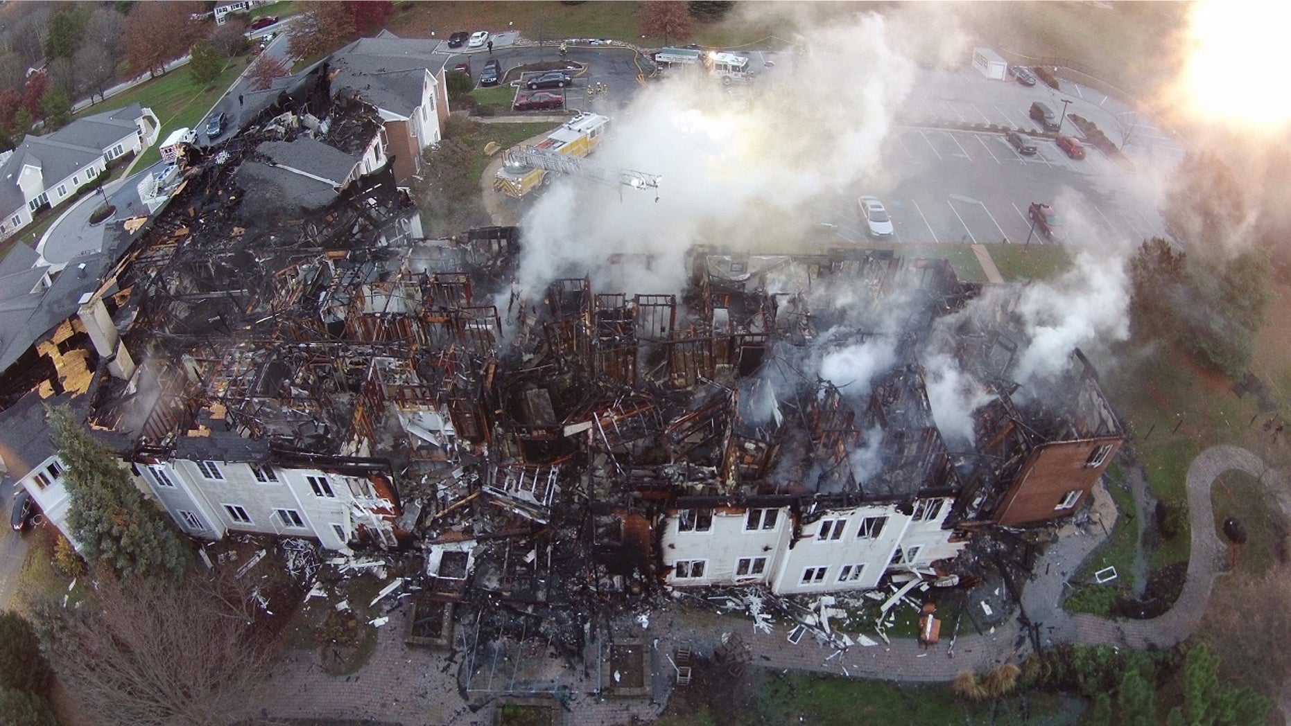 The charred remains of the Barclay Friends Senior Living Community are seen in West Chester, Pa., Nov. 17, 2017.