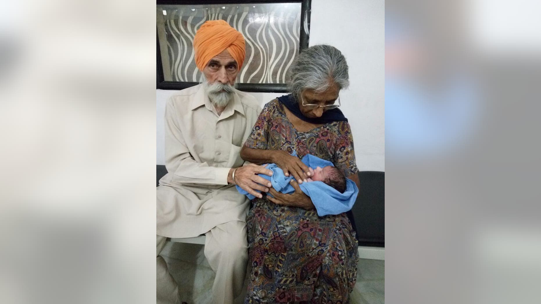 Mohinder Singh Gill and Daljinder Kaur with their newborn son.