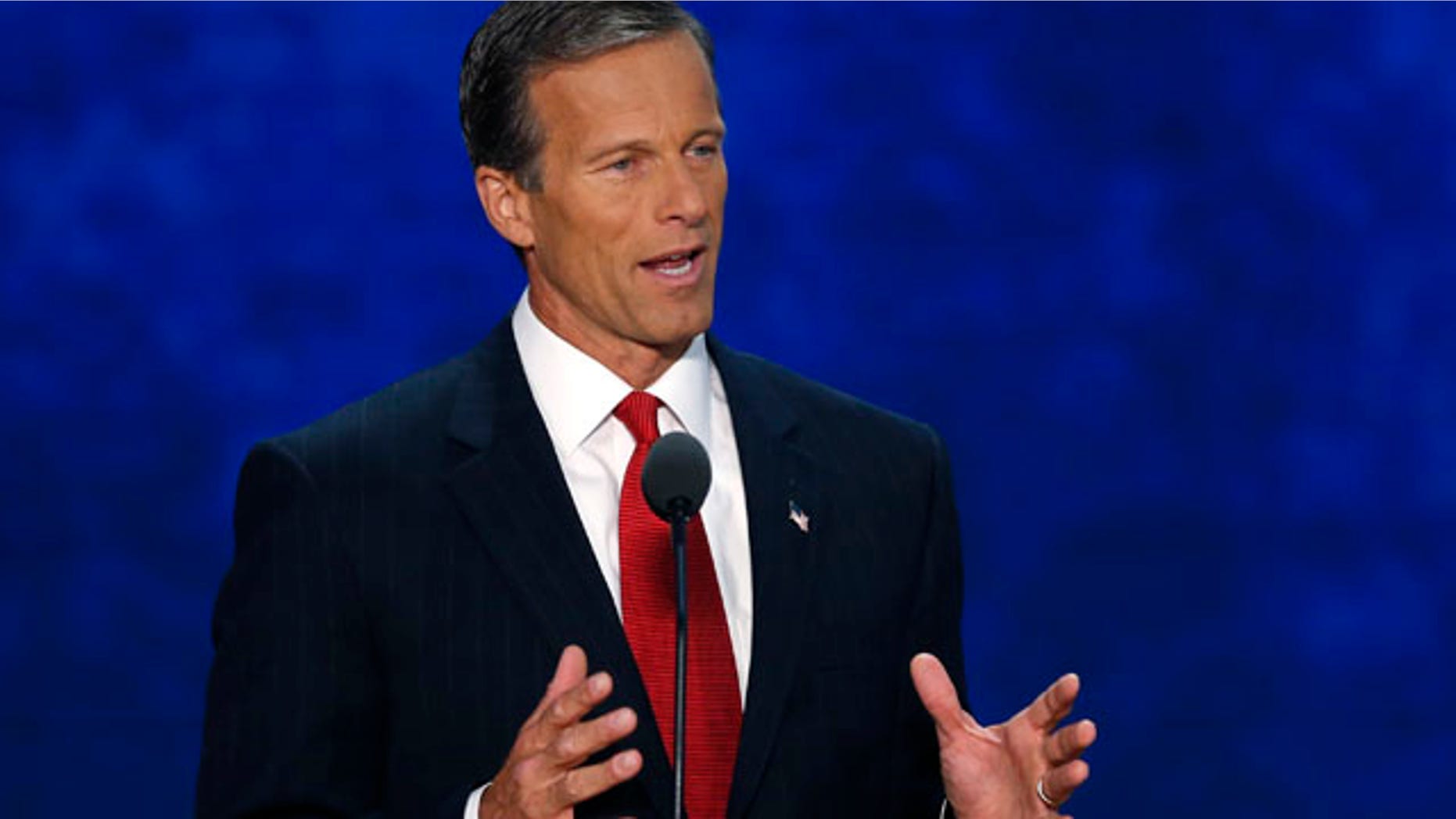 Senator John Thune addresses delegates during the third session of the Republican National Convention in Tampa, Florida.