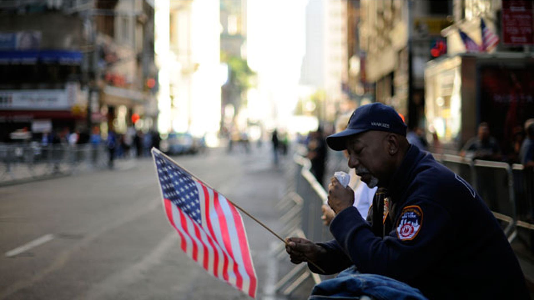 A man wipes away a tear as he listens to the reading of the names during New York City’s September 11th Commemoration Ceremony on Saturday, Sept. 11, 2010, on the ninth anniversary of the terrorist attacks.