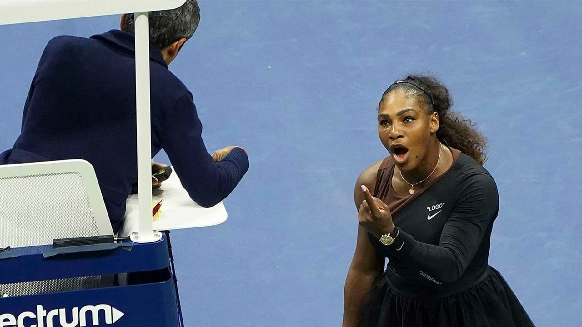 FILE - In this Saturday, Sept. 8, 2018, file photo, Serena Williams argues with the chair umpire during a match against Naomi Osaka, of Japan, during the women's finals of the U.S. Open tennis tournament at the USTA Billie Jean King National Tennis Center, in New York. Some black women say Serena Williamsâ experience at the U.S. Open final resonates with them. They say they are often forced to watch their tone and words in the workplace in ways that men and other women are not. Otherwise, they say, they risk being branded an "Angry Black Woman." (Photo by Greg Allen/Invision/AP, File)