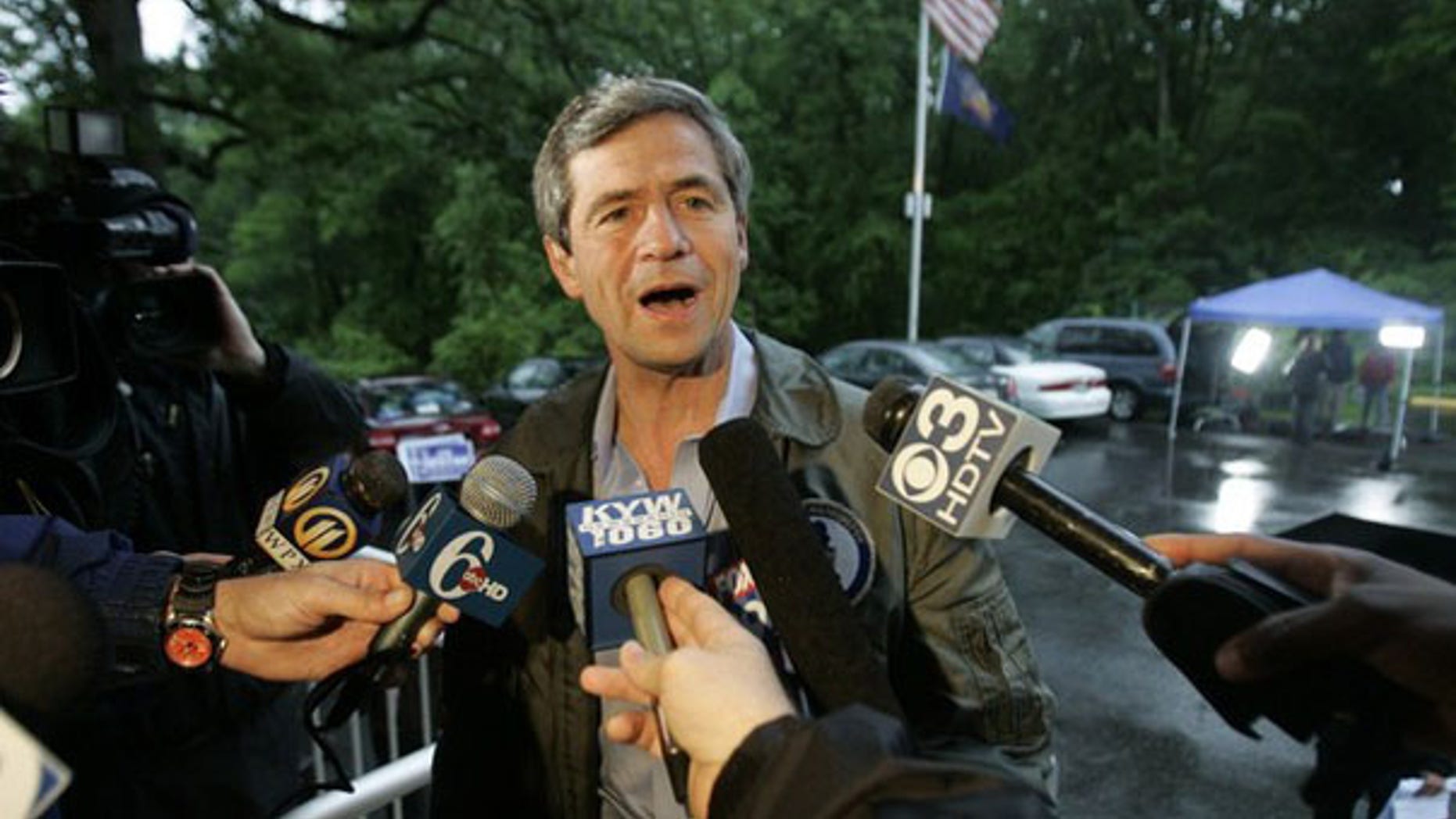 Rep. Joe Sestak talks to reporters as he enters the polling place to vote in the Democratic primary in Gradyville, Pa., May 18. (Reuters Photo)