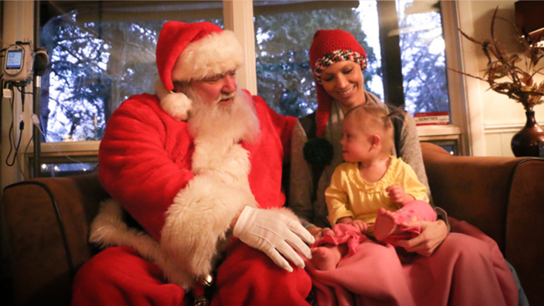 Joey Feek and daughter Indiana with Santa Claus.