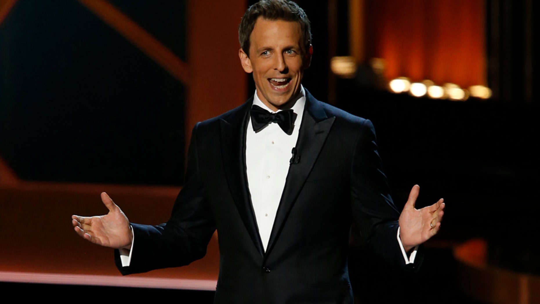 Host Seth Meyers speaks onstage during the 66th Primetime Emmy Awards in Los Angeles, California August 25, 2014.