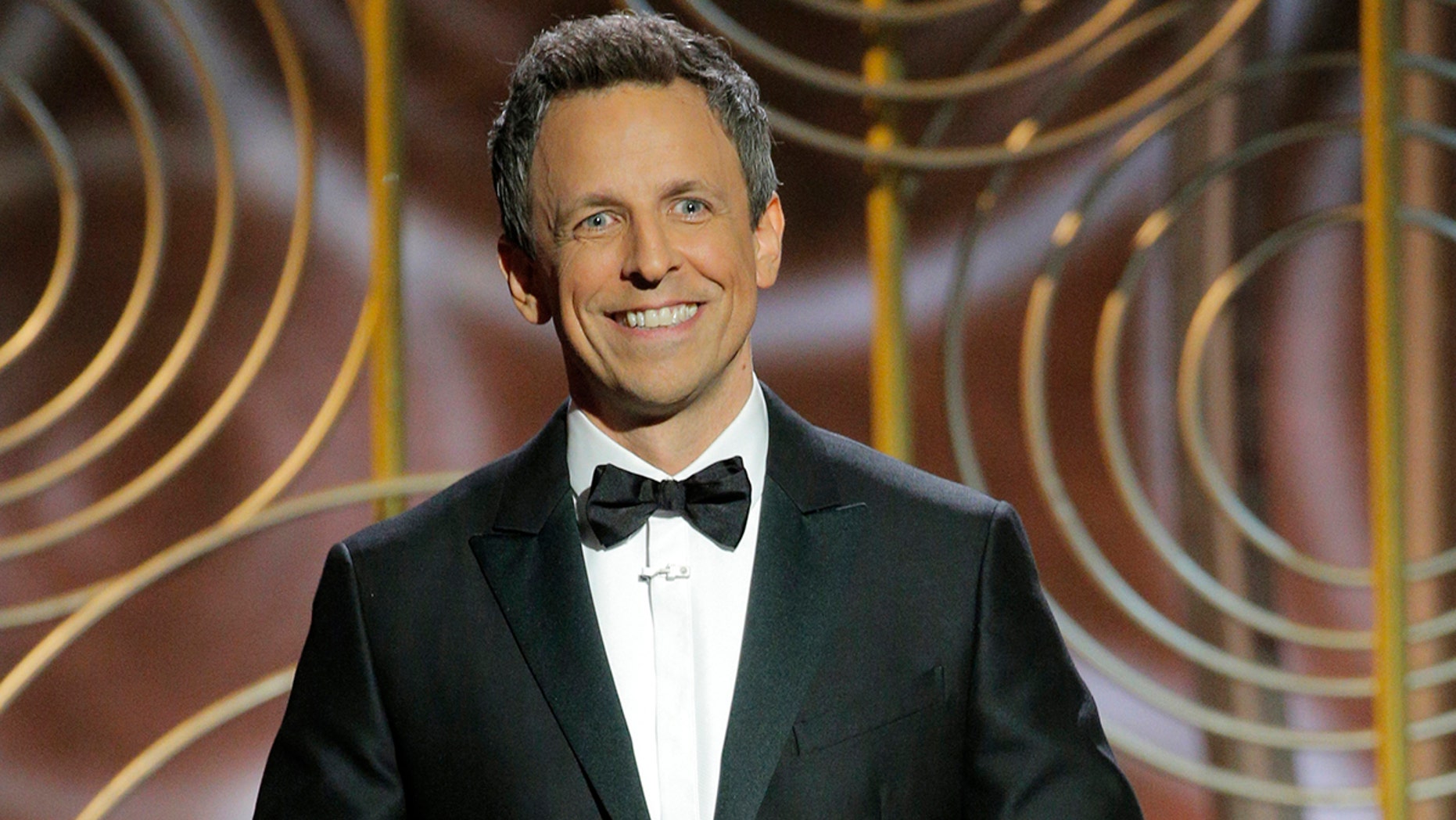This image released by NBC shows host Seth Meyers at the 75th Annual Golden Globe Awards at the Beverly Hilton Hotel in Beverly Hills, Calif., on Jan. 7, 2018. (Paul Drinkwater/NBC via AP)