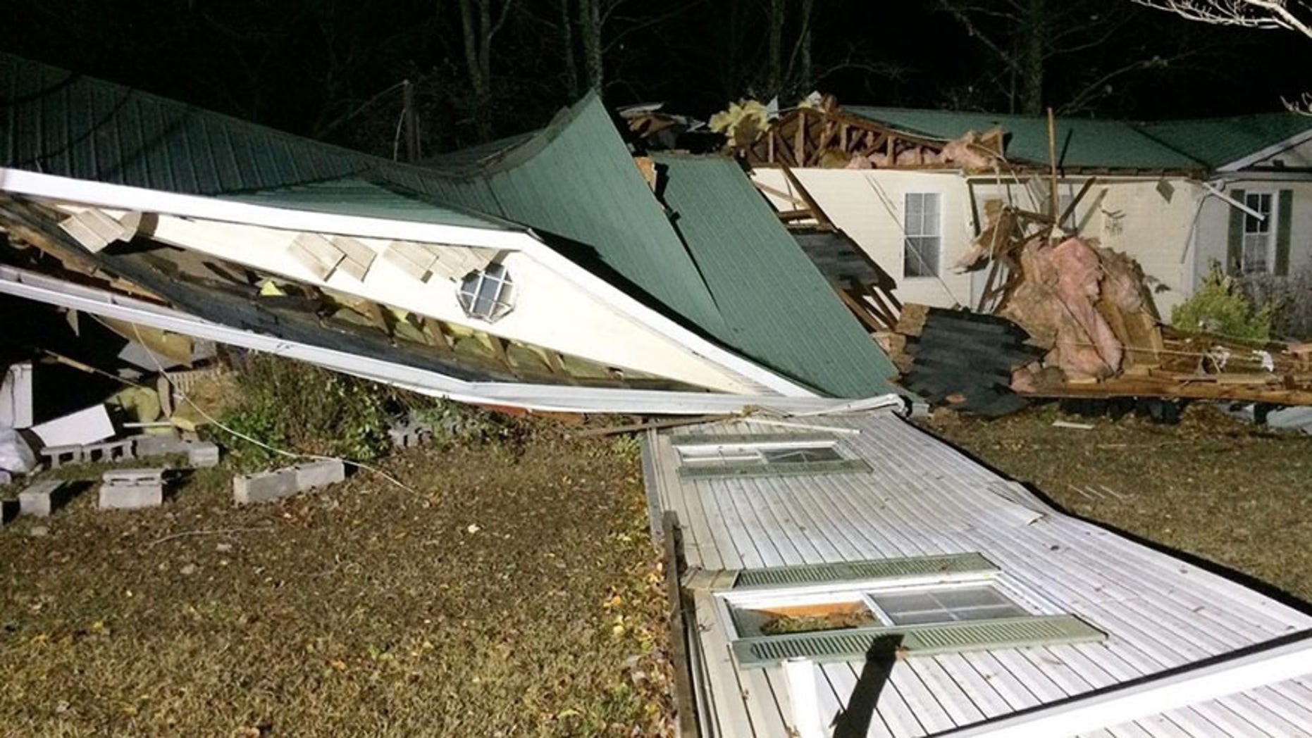 This Tuesday, Nov. 29, 2016 photo shows storm damage in the Arley area of Winston County, Ala. A suspected tornado killed multiple people in Alabama as a line of severe storms moved across the South overnight, authorities said. (Bill Castle/abc3340.com via AP)