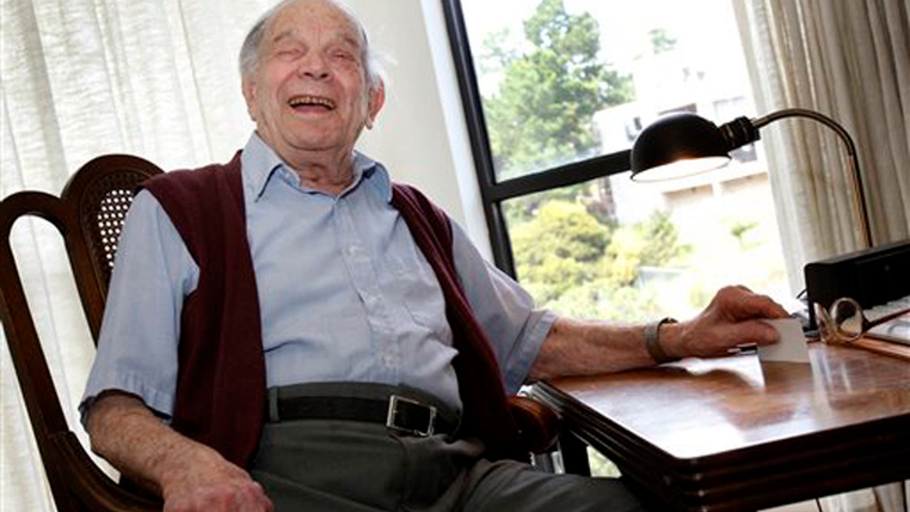 FILE - In this Wednesday April 13, 2011 file photo, Bill Del Monte smiles at his home in Greenbrae, Calif. Bill Del Monte was born shortly before the San Francisco earthquake of 1906 and was one of the youngest to survive. William A. Bill Del Monte died at a retirement home in Marin County Monday, Jan. 11, 2016. He was 11 days shy of his 110th birthday. (Brant Ward/San Francisco Chronicle via AP)