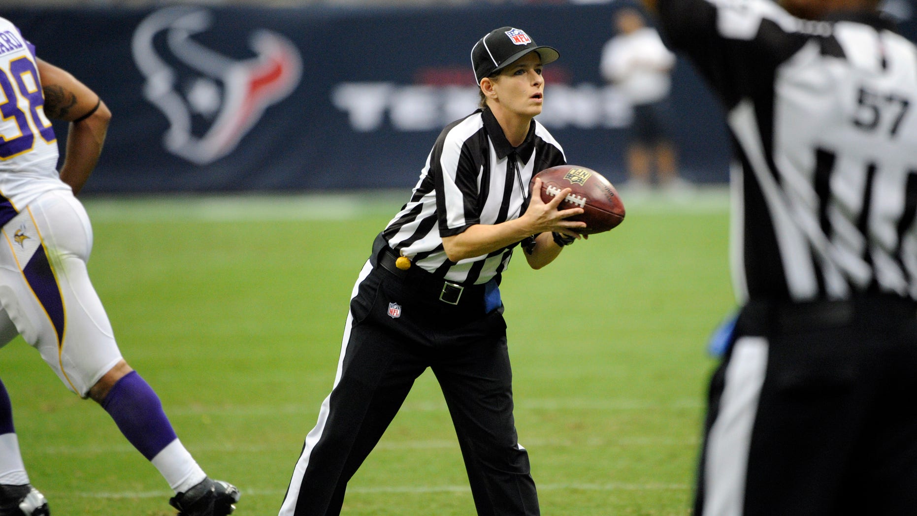 Line Judge Shannon Eastin (27) works the field during the first half of an NFL preseason football game between the Houston Texans and the Minnesota Vikings, Thursday, Aug. 30, 2012, in Houston. (AP Photo/Dave Einsel)