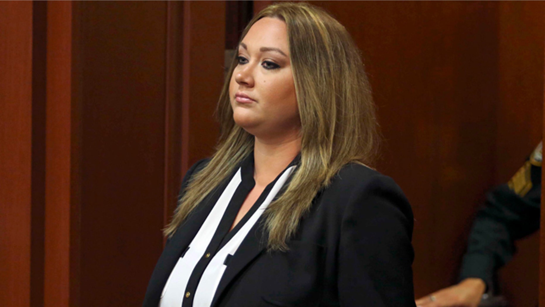 Aug. 28, 2013: Shellie Zimmerman, wife of George Zimmerman, pleads guilty at the Seminole County Courthouse in Sanford, Fla.. Shellie Zimmerman pleaded guilty to a misdemeanor perjury charge for lying during a bail hearing after her husband's arrest, and she was sentenced to a year's probation and 100 hours of community service.