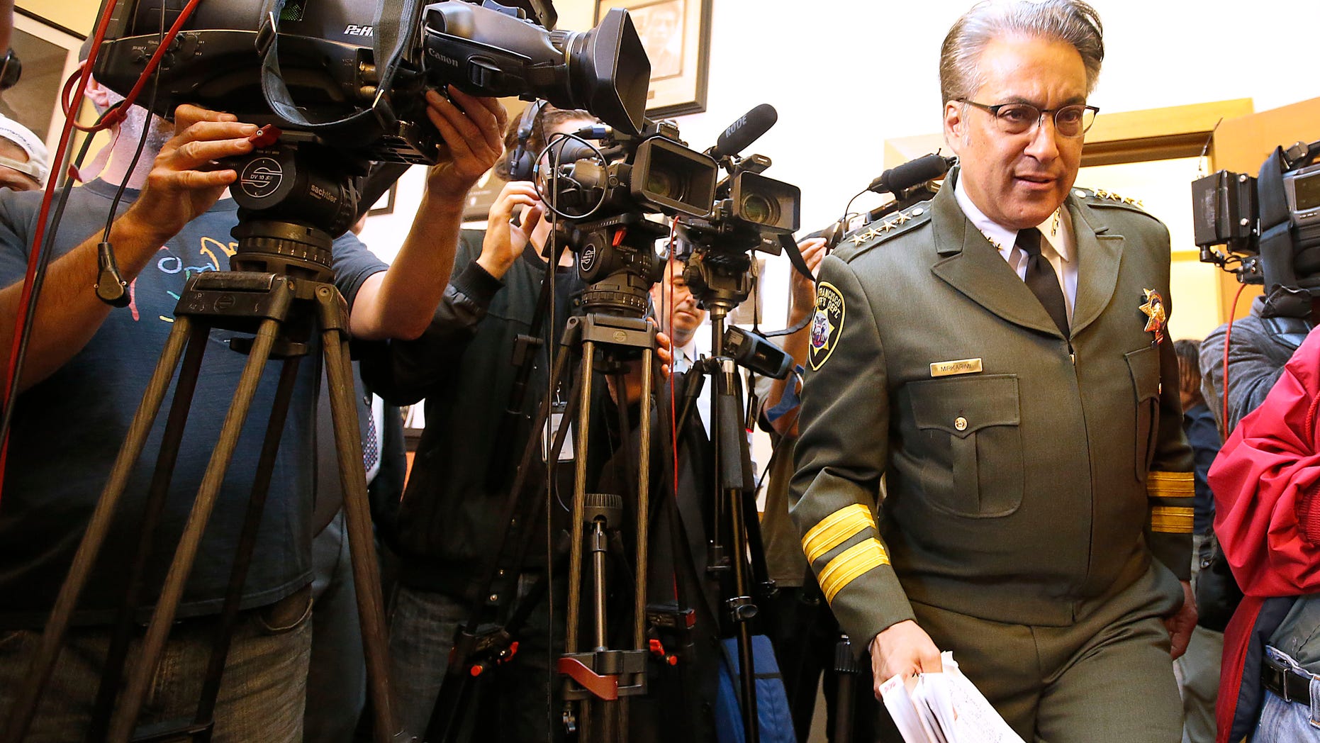 San Francisco Sheriff Ross Mirkarimi arrives to speak at news conference, Friday, July 10, 2015, in San Francisco.