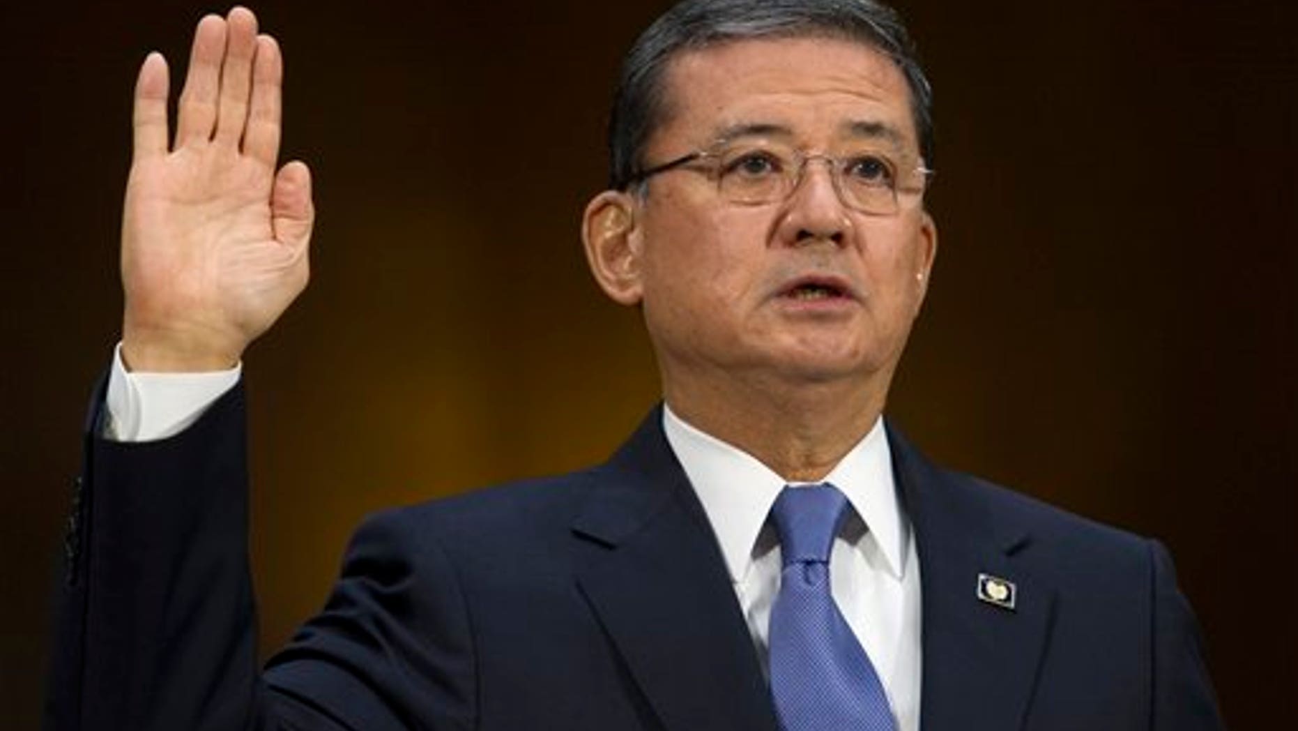 Veterans Affairs Secretary Eric Shinseki is sworn in on Capitol Hill in Washington, Thursday, May 15, 2014, prior to testify before the Senate Veterans Affairs Committee hearing to examine the state of Veterans Affairs health care. (AP Photo/Cliff Owen)