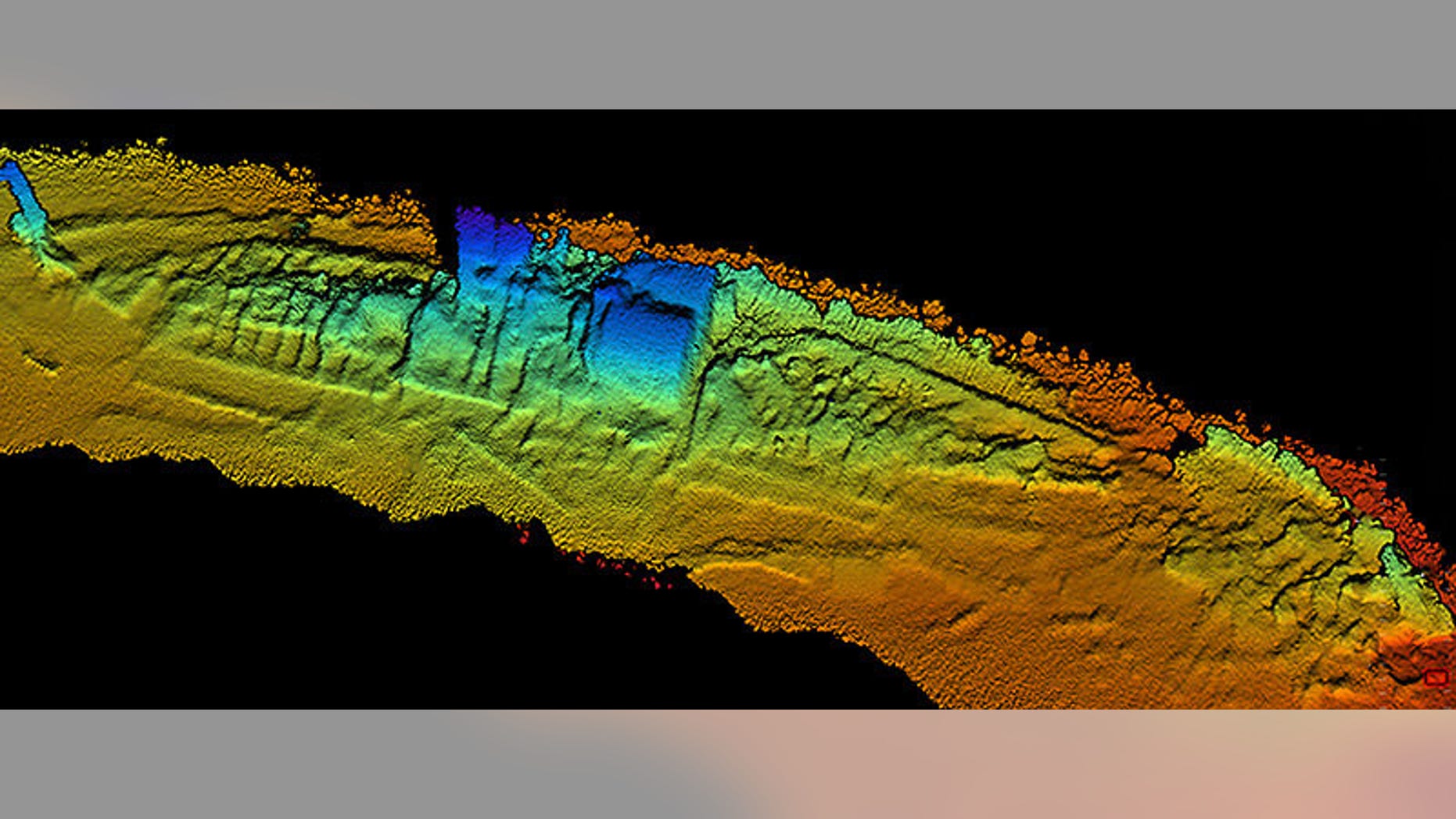 Coda Octopus 3-D Echoscope sonar, downward view of the shipwreck SS City of Chester with sternpost, (left side of sonar image) compound steam engine and boilers (in blue middle of sonar image), and bow (right side of sonar image).