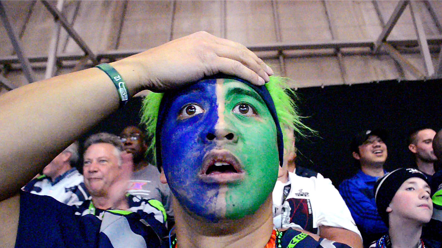 Feb. 1, 2015: Seattle Seahawks' fan grabs his head in the final moments of the Super Bowl as the Seahawks lose to the New England Patriots.