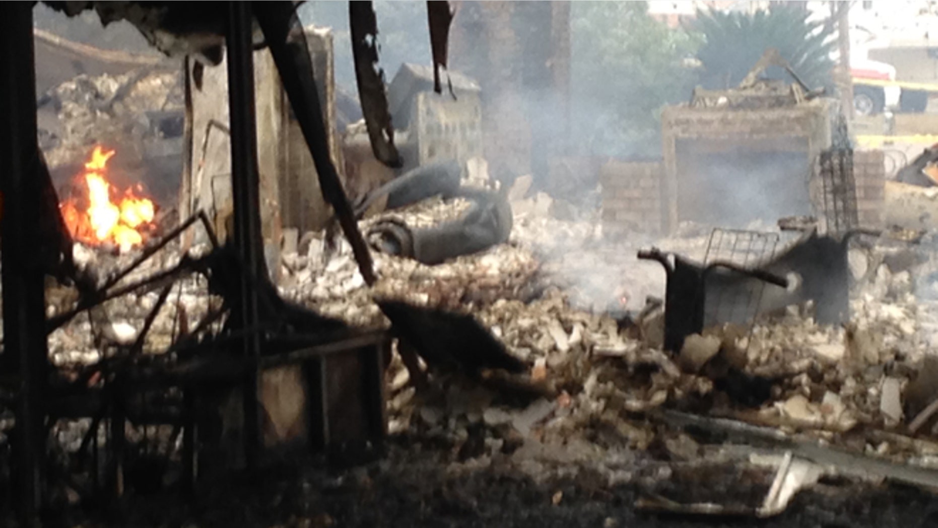 Nov. 22, 2014: This photo shows a home where authorities said a gunman set his house on fire and fatally shot the first deputy who arrived in Tallahasse, Fla. (AP)