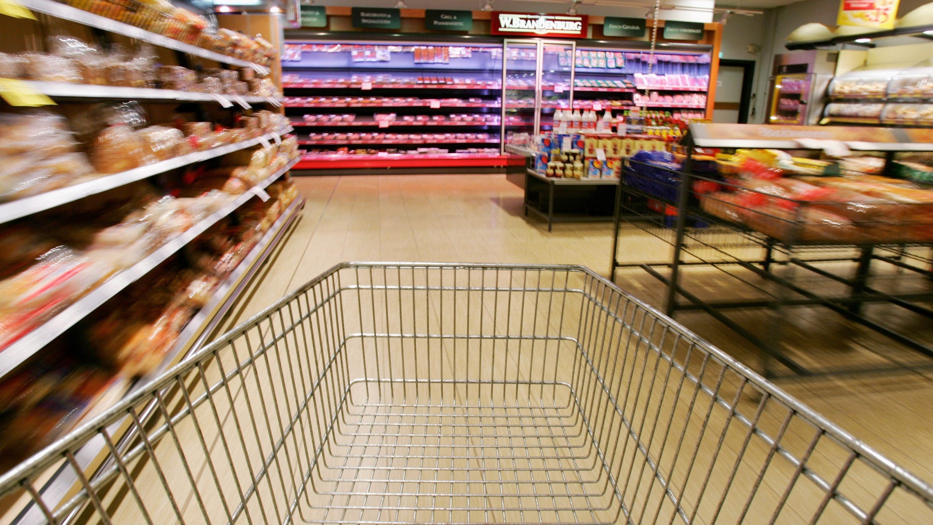 LUNEBURG, GERMANY - JULY 26: In this photo illustration, a shopping cart rolls down the isles of a supermarket on July 26, 2005 in Luneburg, Germany. Sparked by the election manifesto of the opposition party CDU, Germany currently debates whether raising the Mehrwertsteuer (VAT) would in fact promote economic growth or if it would have the opposite effect by hurting families and low-income households. (Photo by Andreas Rentz/Getty Images)
