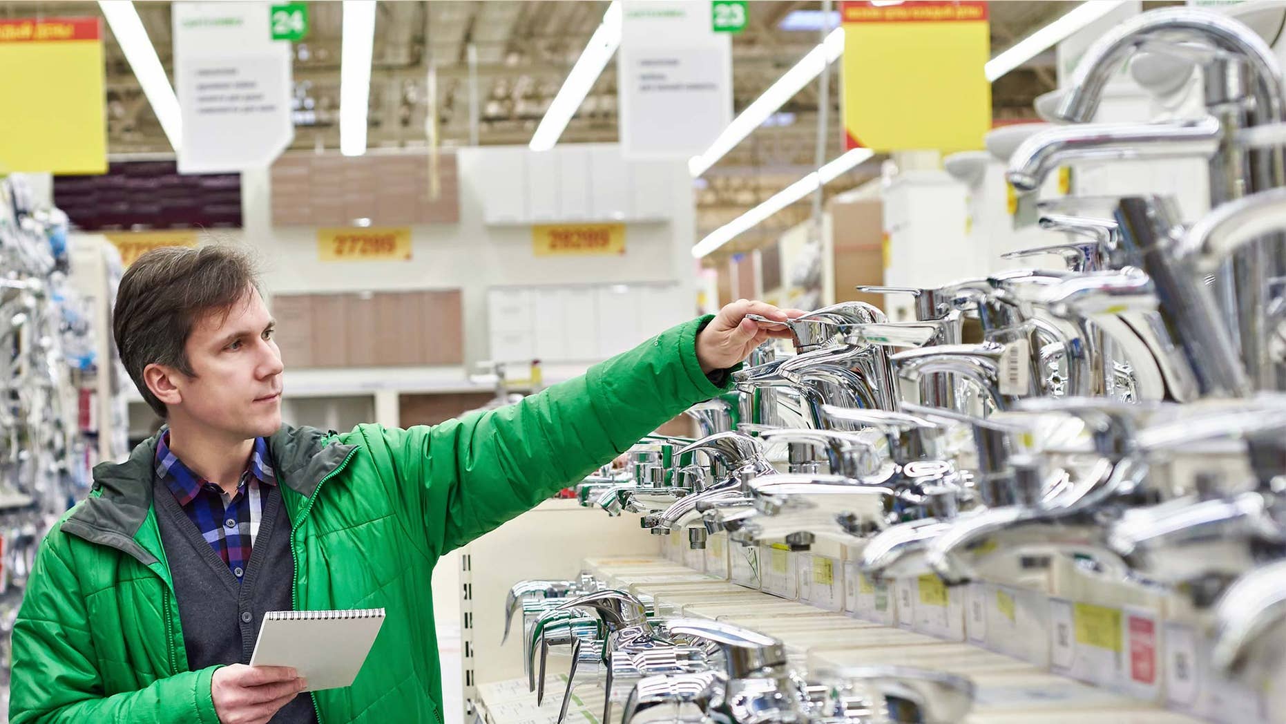 shopping in hardware store for faucets