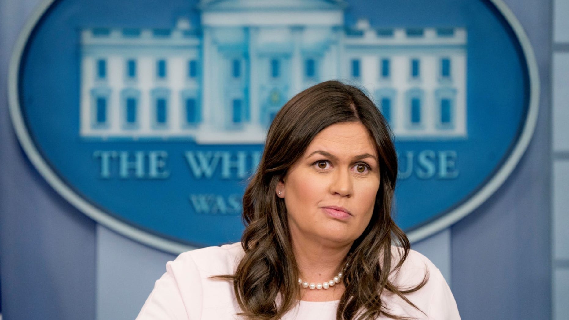 White House press secretary Sarah Sanders hit back Wednesday night against reports that she was considering leaving her role.