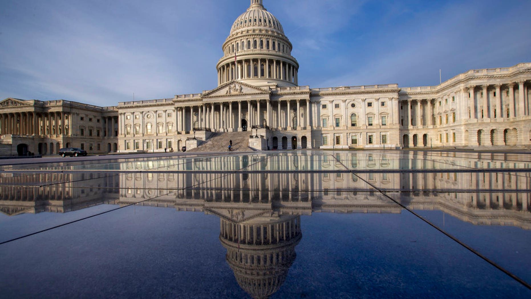 FILE- This Jan. 3, 2018, file photo shows the Capitol in Washington. The government is financed through Friday, Jan. 19, and another temporary spending bill is needed to prevent a partial government shutdown after that. (AP Photo/J. Scott Applewhite, File)